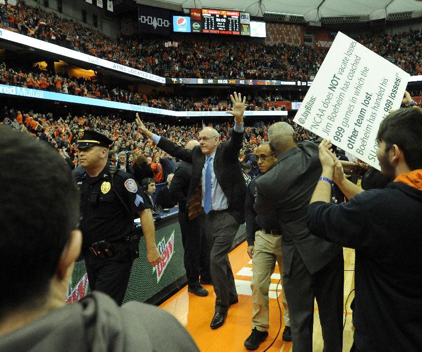 Syracuse head coach Jim Boeheim leaves the court following the second half of an NCAA college basketball game in Syracuse, N.Y., Saturday, Feb. 4, 2017. Syracuse beat Virginia,2 66-62. (AP Photo/Adrian Kraus)