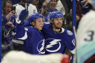 Tampa Bay Lightning center Ross Colton, left, celerates his goal against the Seattle Kraken with left wing Boris Katchouk (13) during the second period of an NHL hockey game Friday, Nov. 26, 2021, in Tampa, Fla. (AP Photo/Chris O'Meara)