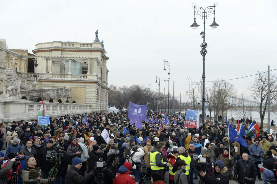 Demonstrators gather during a protest against the recent amendments to the labour code, dubbed 'slave law' by opposition forces, in downtown Budapest, Hungary, Saturday, Jan. 19, 2019. (Zoltan Balogh/MTI via AP)