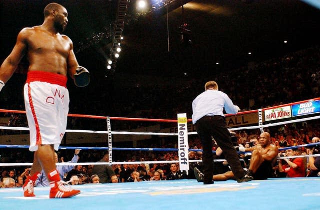 Buster Douglas, left, sent shockwaves through boxing in 1990 (Sean Dempsey/PA)