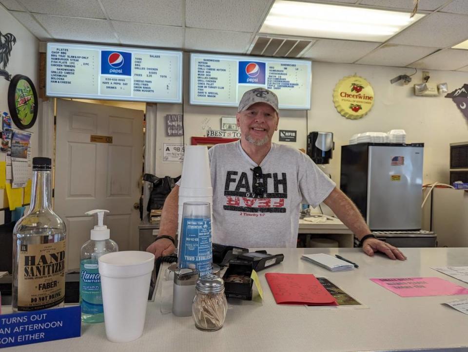 Eddie Hollar, owner of Hollar’s Backstreet Grill in Taylorsville, stands behind the counter during lunchtime on Friday, Sept. 1. He said he has many customers and friends who worked at Mitchell Gold + Bob Williams furniture company, which closed Aug. 25. Catherine Muccigrosso/cmuccigrosso@charlotteoberver.com