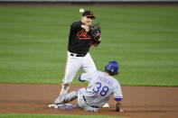 Texas Rangers' DJ Peters (38) is out at second as Baltimore Orioles second baseman Pat Valaika (11) throws to first to put out Jonah Heim for a double-play during the fourth inning of a baseball game, Friday, Sept. 24, 2021, in Baltimore. (AP Photo/Nick Wass)