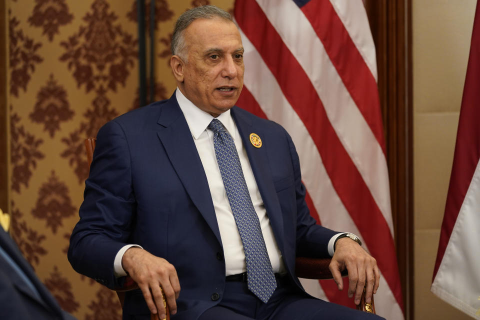 Iraqi Prime Minister Mustafa Al-Kadhimi talks during a meeting with US President Joe Biden, Saturday, July 16, 2022, in Jeddah, Saudi Arabia. (AP Photo/Evan Vucci)