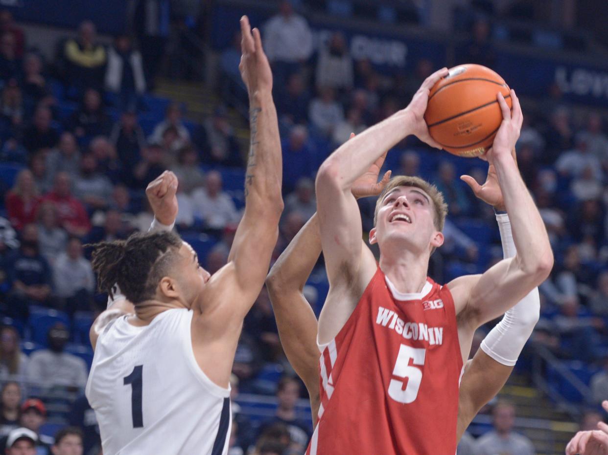 Wisconsin's Tyler Wahl shoots against Penn State's Seth Lundy during the second half Wednesday in State College, Pa.