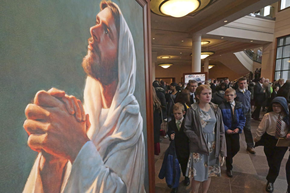People attend the twice-annual conference of the Church of Jesus Christ of Latter-day Saints, Saturday, April 6, 2024, in Salt Lake City. (AP Photo/Rick Bowmer)