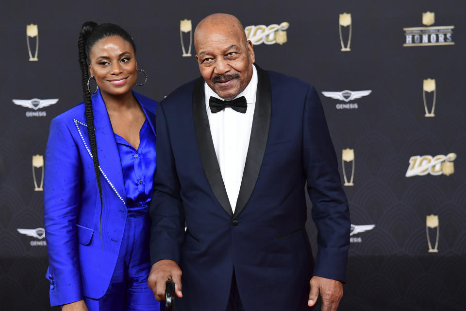 IMAGE DISTRIBUTED FOR NFL - From left, Monique Brown and Jim Brown arrive at the 9th Annual NFL Honors at the Adrienne Arsht Center in Miami on Saturday, Feb. 1, 2020. (Joy Asico/AP Images for NFL)