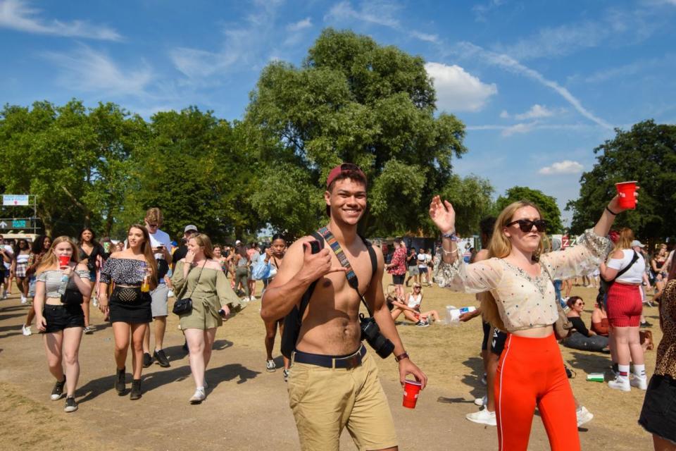 Scorcher! Festival-goers in Finsbury Park in north London attend Wireless (PA)