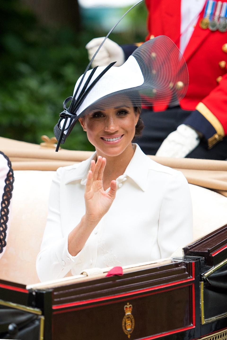 Exactly one month after her royal wedding, Meghan looked perfectly polished for her <a rel="nofollow noopener" href="https://people.com/royals/meghan-markle-royal-ascot-photos/" target="_blank" data-ylk="slk:first time attending the Royal Ascot;elm:context_link;itc:0;sec:content-canvas" class="link ">first time attending the Royal Ascot</a>. 