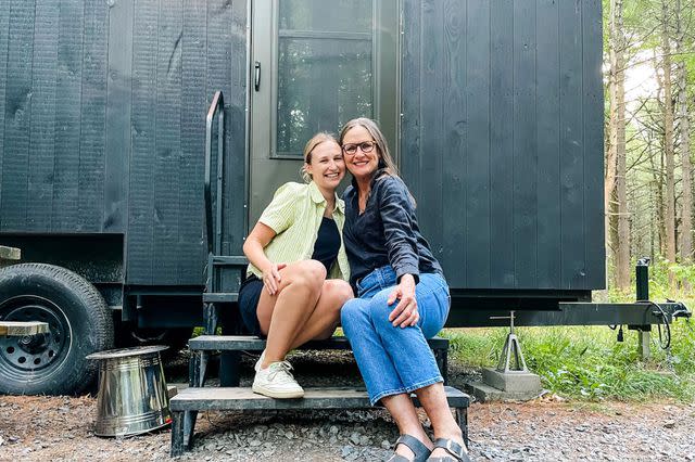 <p>Madeline Diamond</p> The author and her mother outside their Getaway House Cabin.