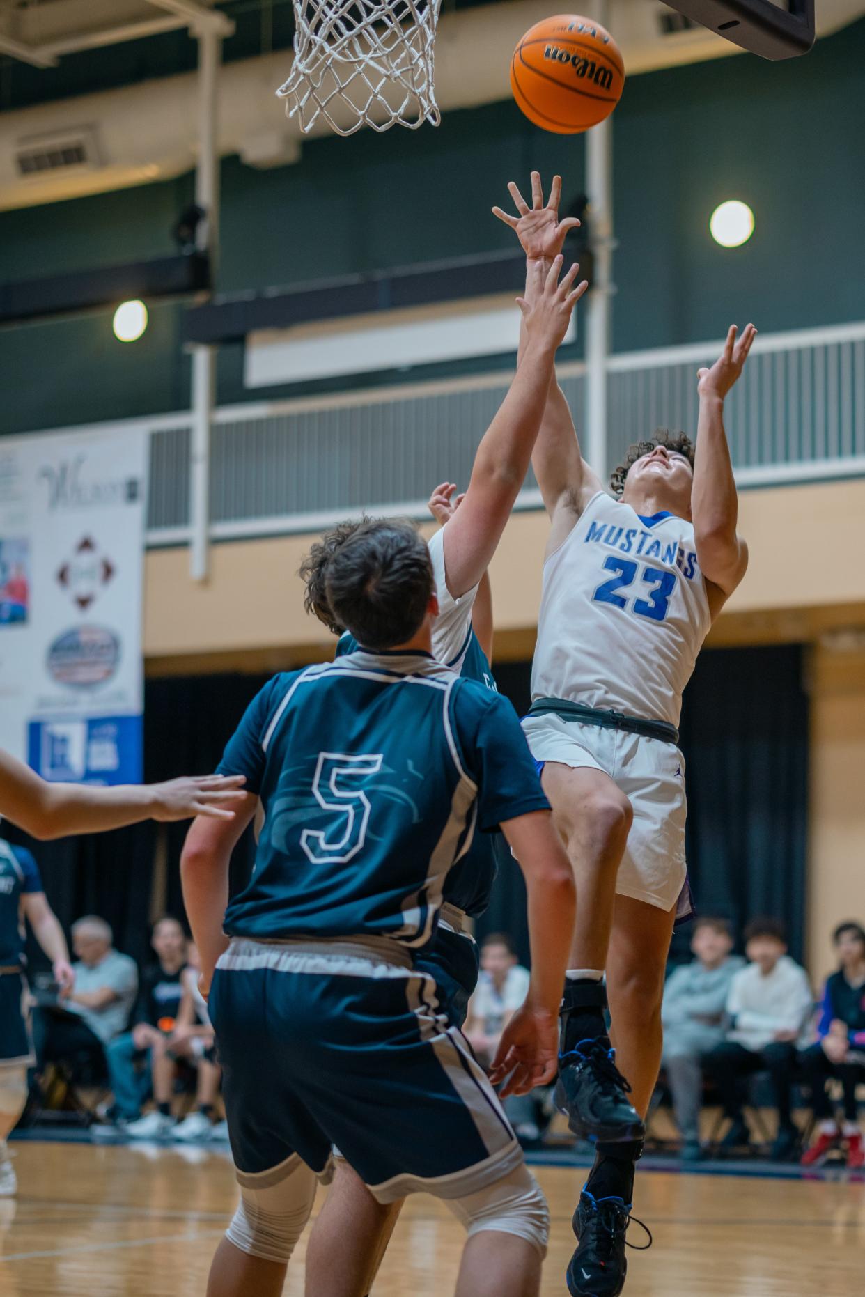 WCS's Kade Kelley makes a layup with contact during a game vs. Eagle Point Christian. Kelley poured in a season-high 31 points last Tuesday in a 77-65 thumping of Mingo Valley.