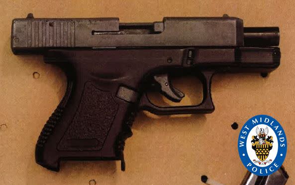 A a loaded Glock-style blank-firing pistol was found in the suspect's car (Picture: West Midlands Police)