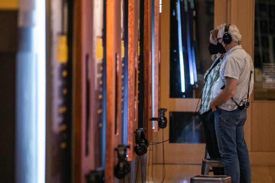 People visit the Woody Guthrie Center in Tulsa on Saturday, May 7, 2022.