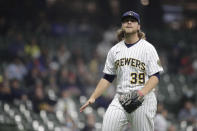 Milwaukee Brewers' Corbin Burnes reacts after striking out a batter during the sixth inning of a baseball game against the Minnesota Twins, Saturday, April 3, 2021, in Milwaukee. (AP Photo/Aaron Gash)