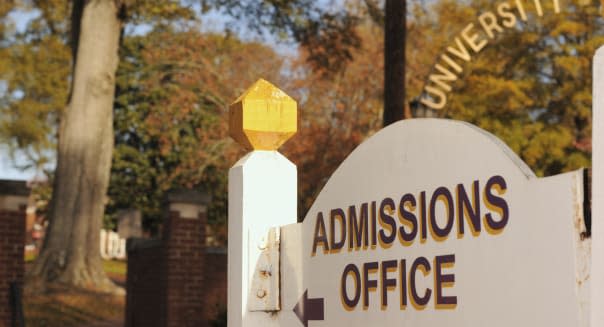 Admissions office sign at university