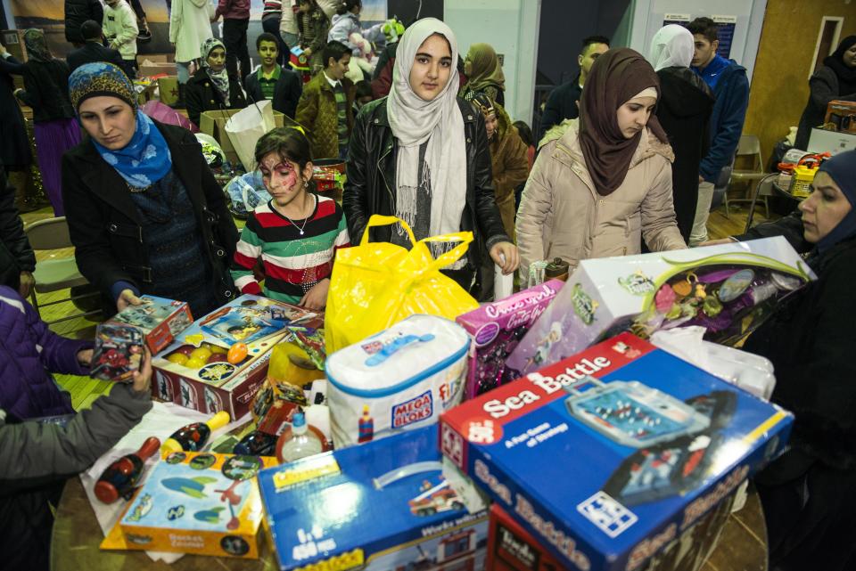 UNION CITY, NJ - DECEMBER 20:  Syrian refugees are welcomed to the United States at a party in their honor at the North Hudson Islamic Educational Center in Union City, New Jersey on Sunday Dec. 20, 2015. (Photo by Damon Dahlen, Huffington Post) *** Local Caption *** 