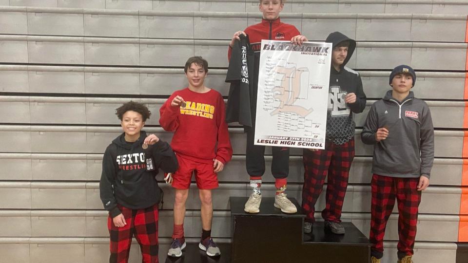 Reid Westfall (second from left) took third place in the BlackHack Invitational 106-pound weight class tournament.