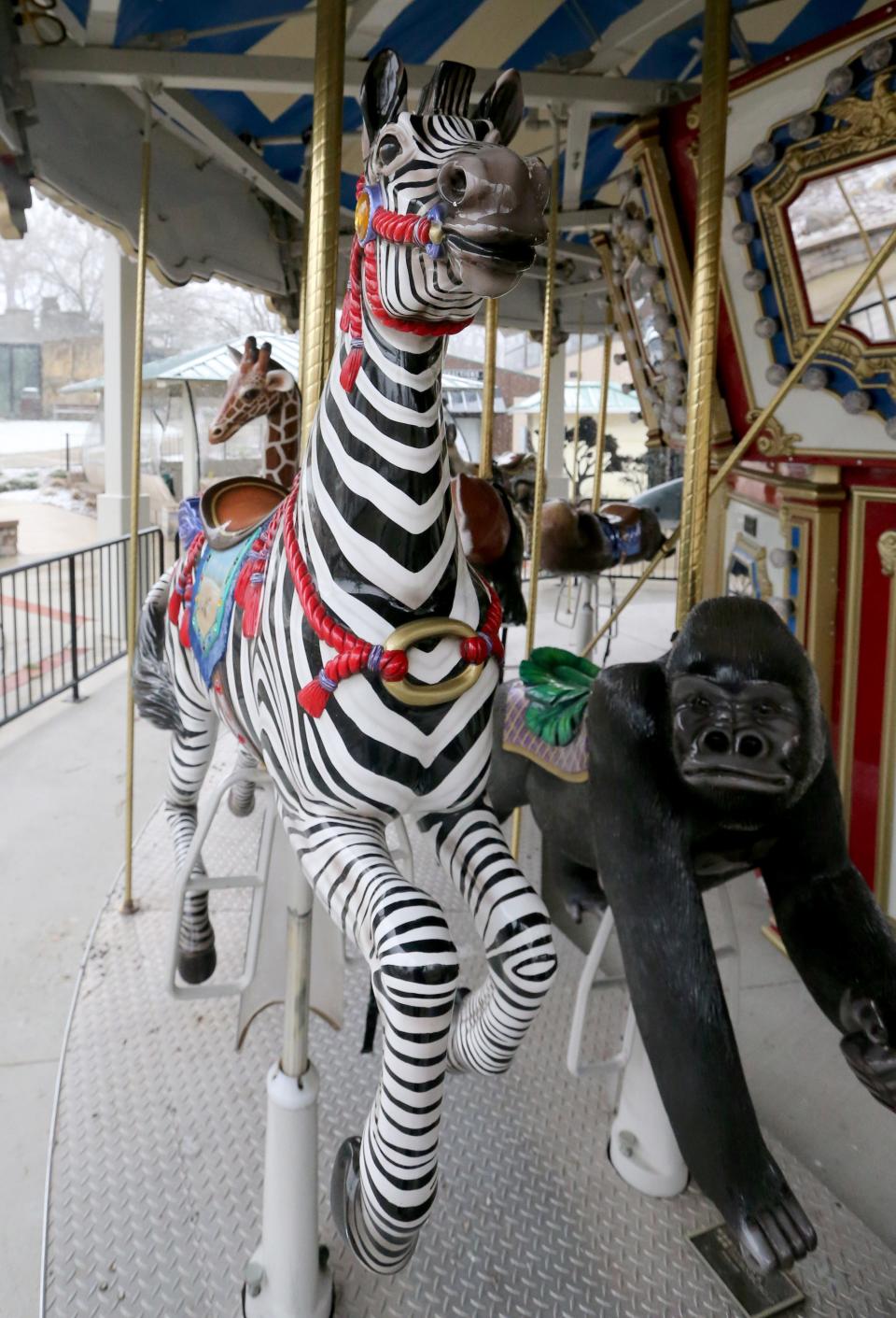 A zebra and gorilla stand ready on the carousel Wednesday, March 29, 2023, at the Potawatomi Zoo. The zoo opens for the season on Friday in South Bend.