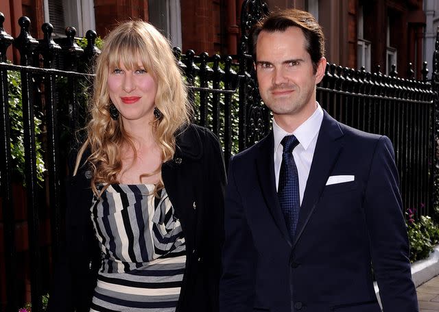 <p>Gareth Cattermole/Getty</p> Jimmy Carr and Karoline Copping leave the wedding of David Walliams and Lara Stone on May 16, 2010 in London, England.