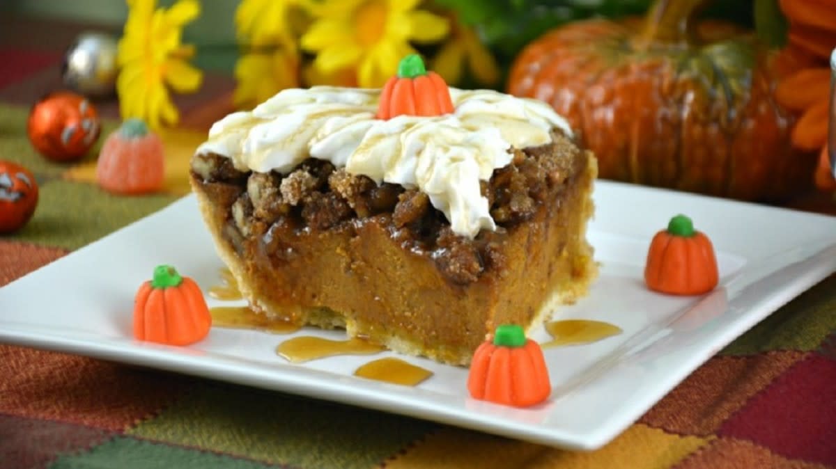 <p>Kitchen Divas</p><p>An incredibly memorable dessert!</p><p><strong>Get the recipe: </strong><a href="https://kitchendivas.com/praline-pumpkin-pie/" rel="nofollow noopener" target="_blank" data-ylk="slk:Grandma's Pumpkin Praline Pie;elm:context_link;itc:0;sec:content-canvas" class="link rapid-noclick-resp"><strong>Grandma's Pumpkin Praline Pie</strong></a></p>