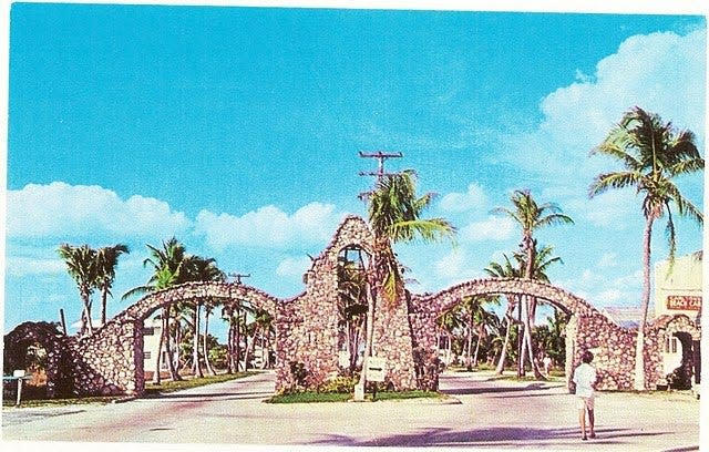 A postcard shows the original Fort Myers Beach arches.