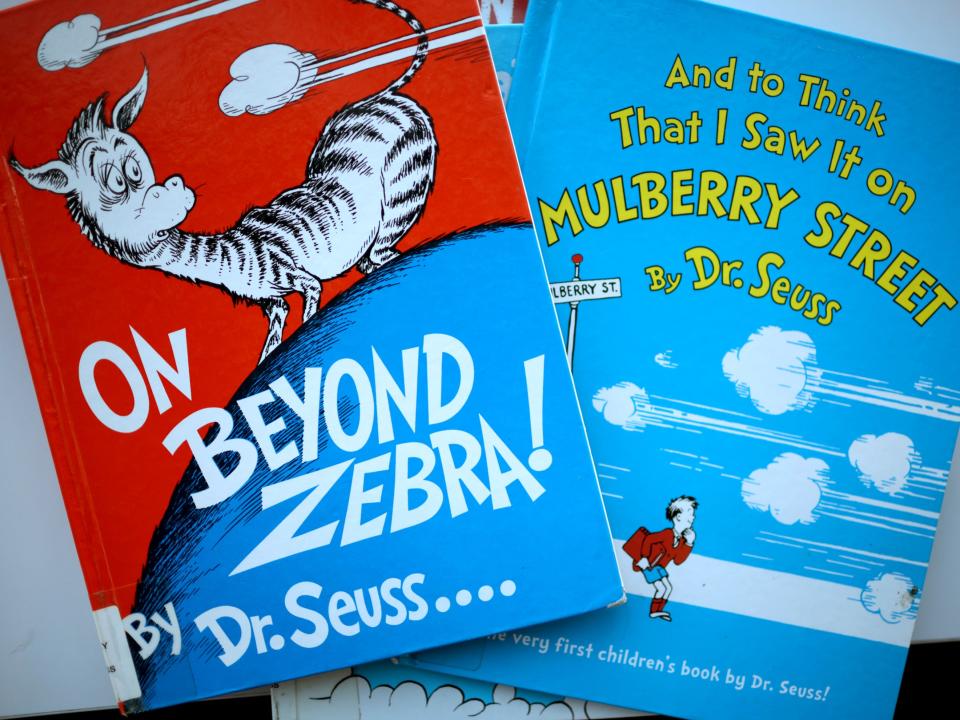 Two of the six Dr Seuss books that have been pulled from publication (Scott Olson/Getty Images)