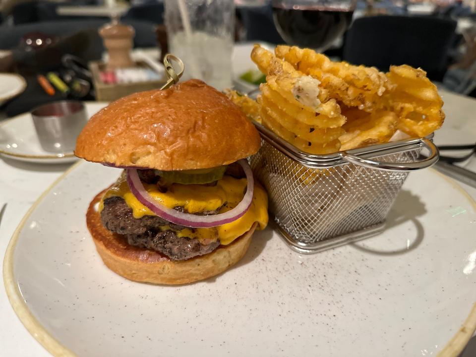 burger and fries on a plate at Steakhouse 71 in the contemporary resort at disney world
