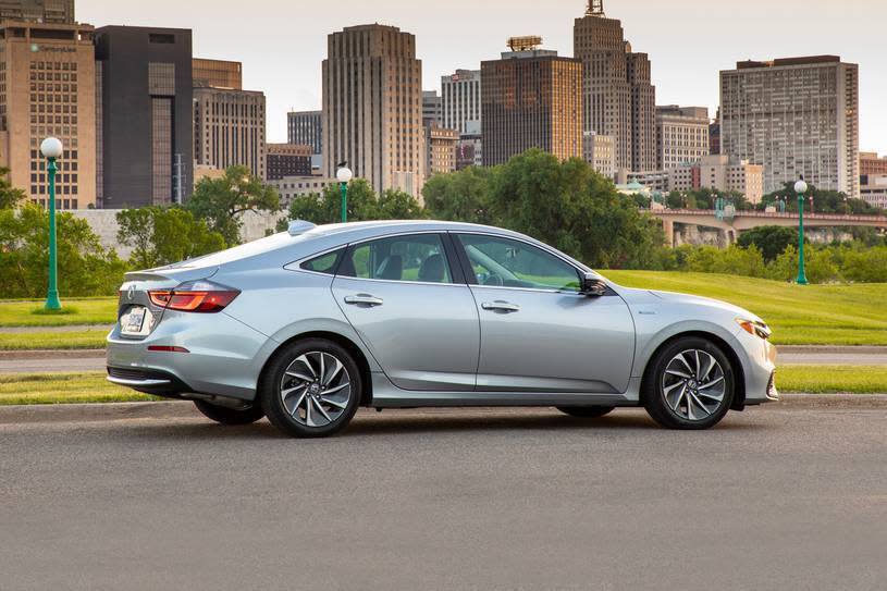 This photo provided by Honda shows the 2019 Honda Insight Hybrid. Car shoppers seeking high fuel economy have two particularly intriguing choices this year: the Honda Insight and the Toyota Corolla Hybrid. Both deliver an EPA-estimated 52 mpg in combined city and highway driving, which is among the best of any vehicle on sale. (Honda via AP)