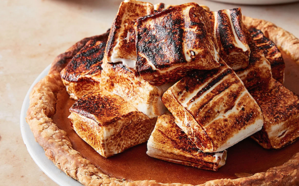 <p>Mark Weinberg</p><p>This pumpkin pie with toasted marshmallows puts a fun twist on the traditional Thanksgiving dessert. </p><p><strong>Get the recipe: <em><a href="https://parade.com/1118126/parade/pumpkin-pie-with-marshmallows/" rel="nofollow noopener" target="_blank" data-ylk="slk:Pumpkin Pie with Toasted Marshmallows;elm:context_link;itc:0;sec:content-canvas" class="link rapid-noclick-resp">Pumpkin Pie with Toasted Marshmallows</a></em></strong></p>