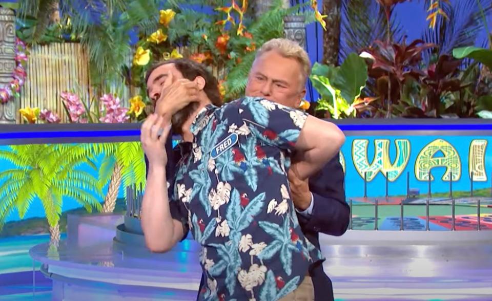 Pat Sajak puts a contestant in a chokehold during a weird moment on “Wheel of Fortune” in March 2023. Wheel Of Fortune