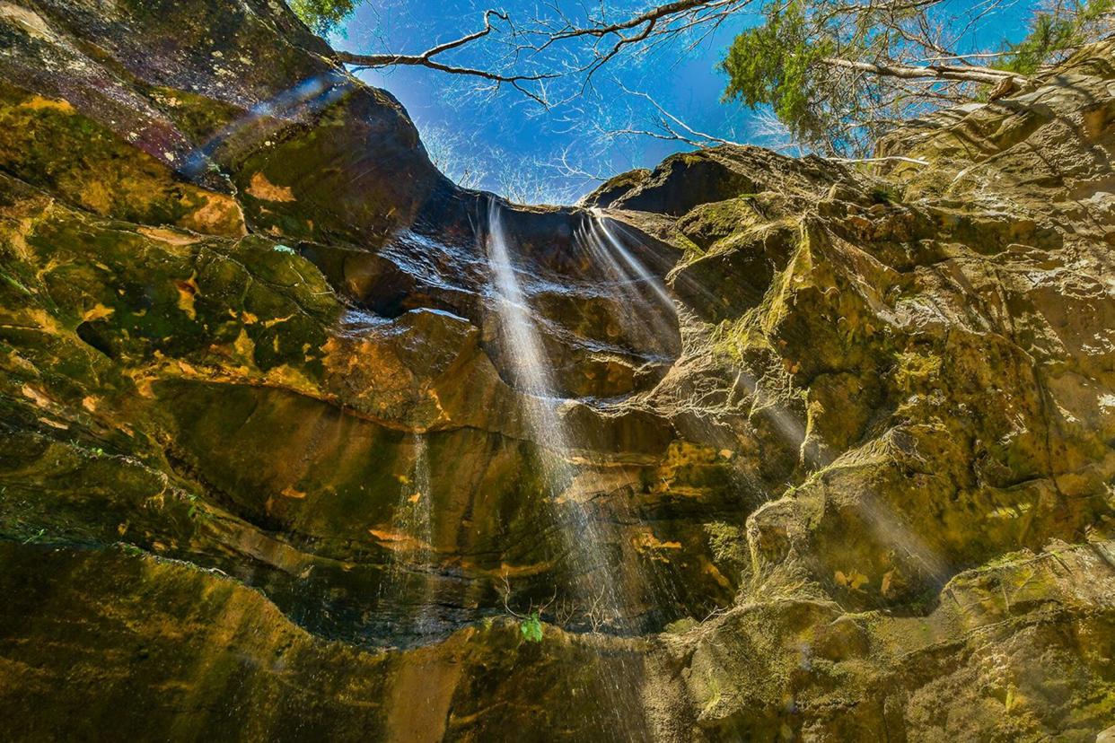 Looking up at a waterfall at Hemlock Cliffs, Indiana