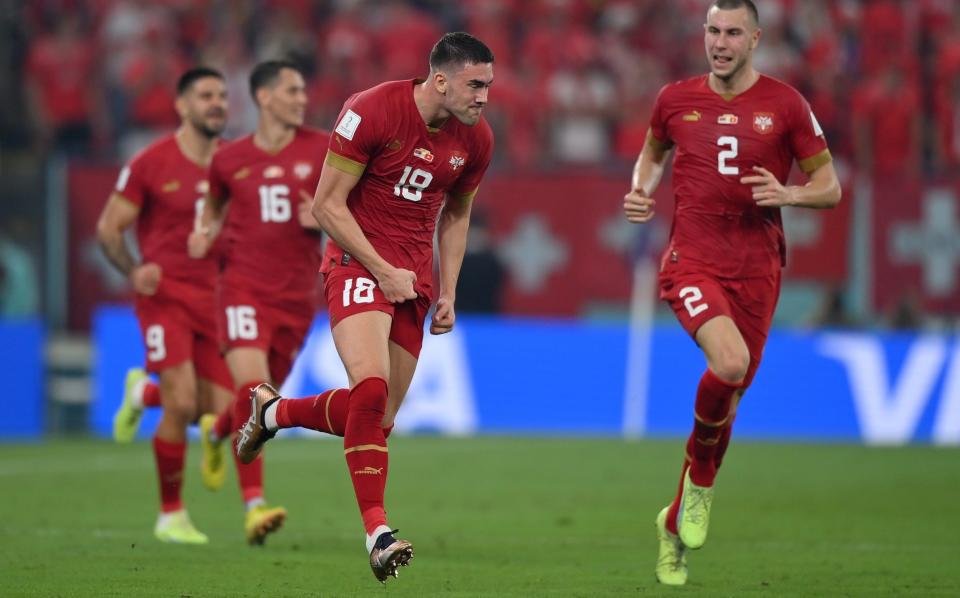 Dusan Vlahovic of Serbia celebrates with Strahinja Pavlovic after scoring the team's second goal during the FIFA World Cup Qatar 2022 Group G match between Serbia and Switzerland at Stadium 974 - Getty Images