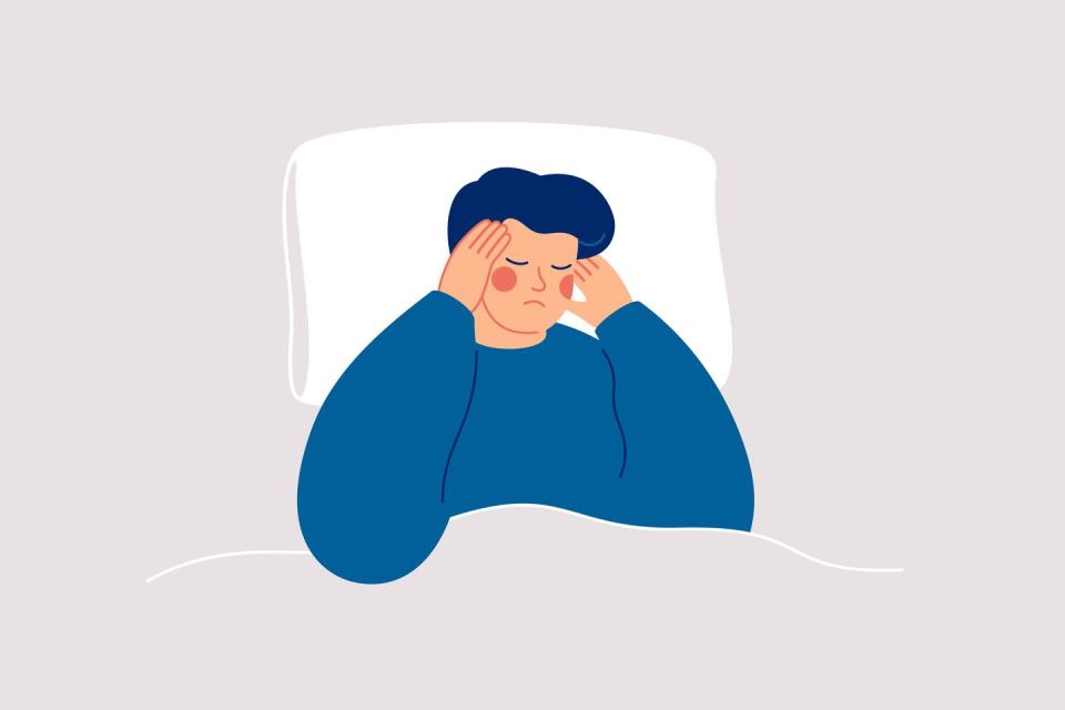 man suffers from insomnia and had difficulty falling asleep boy has headaches during nighttime sleepy male lying on bed and touching his temple insomnia and trouble sleeping disorder vector illus