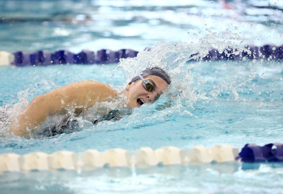 Shawnee's Piper McNeil swims in the 100-yard freestyle during the Class 5A state finals Saturday at Edmond Schools Aquatic Center.