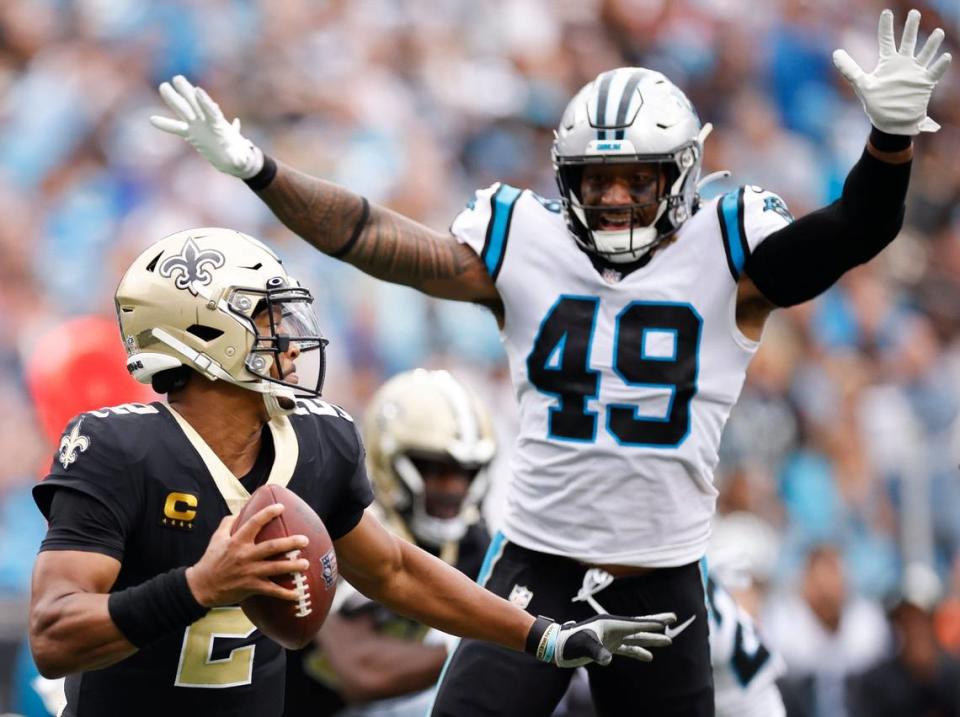 Carolina Panthers linebacker Frankie Luvu (49) pressures New Orleans Saints quarterback Jameis Winston (2) who throes the ball away during a game at Bank of America Stadium in Charlotte, N.C., Sunday, Sept. 25, 2022.