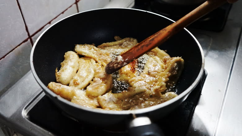 Bananas frying in oil