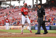 Cincinnati Reds' Albert Almora Jr. yells as he scores a run on a triple by Mark Reynolds during the third inning of a baseball game against the Chicago Cubs in Cincinnati, Thursday, May 26, 2022. (AP Photo/Aaron Doster)