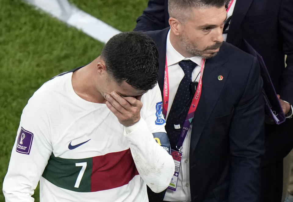 Portugal's Cristiano Ronaldo leaves the field at the end of the World Cup quarterfinal soccer match between Morocco and Portugal, at Al Thumama Stadium in Doha, Qatar, Saturday, Dec. 10, 2022. (AP Photo/Luca Bruno)