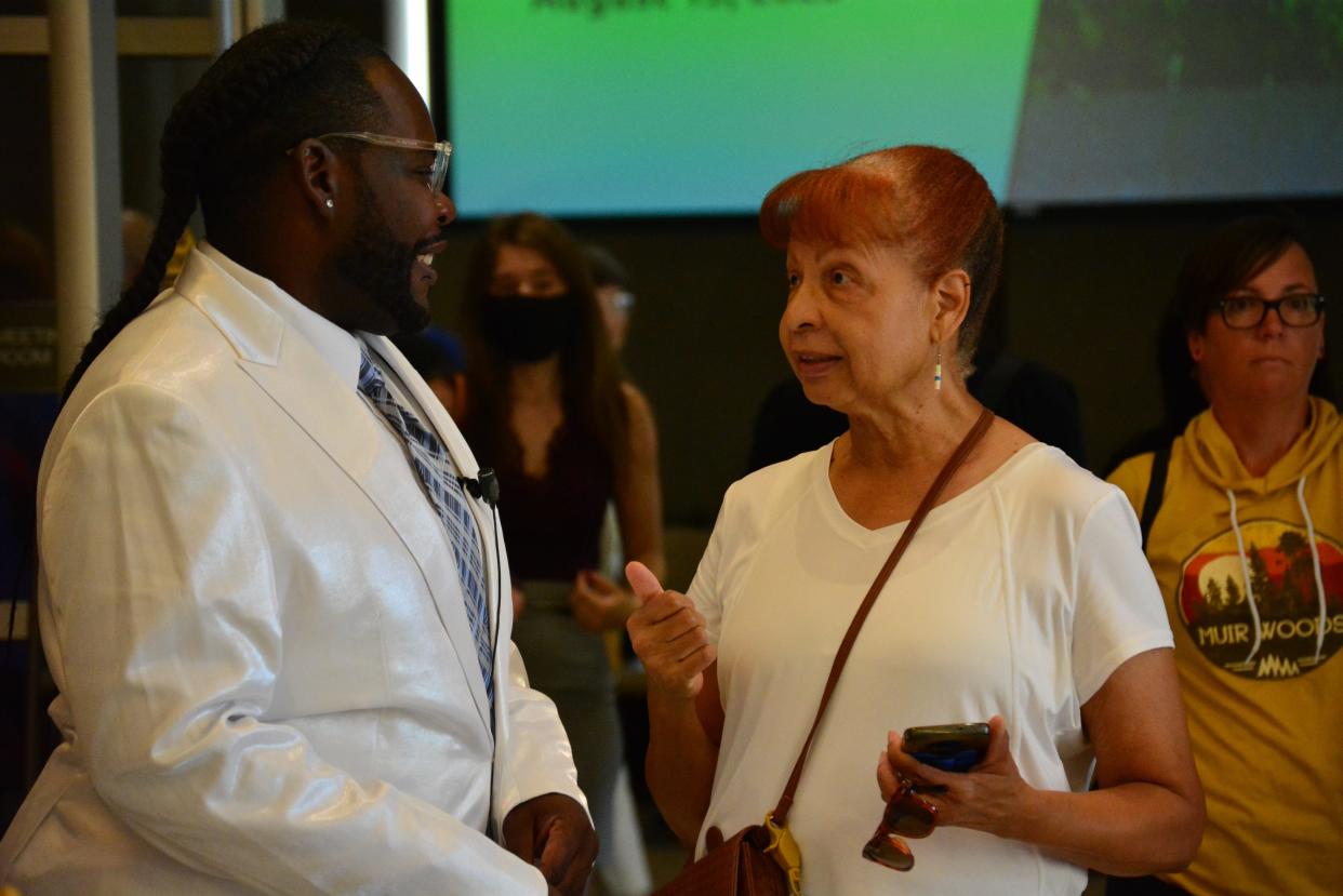 New Third Ward council member Roy Lovelady chats with friend and supporter Annabelle Simmons prior to his swearing-in ceremony Saturday at Columbia City Hall.