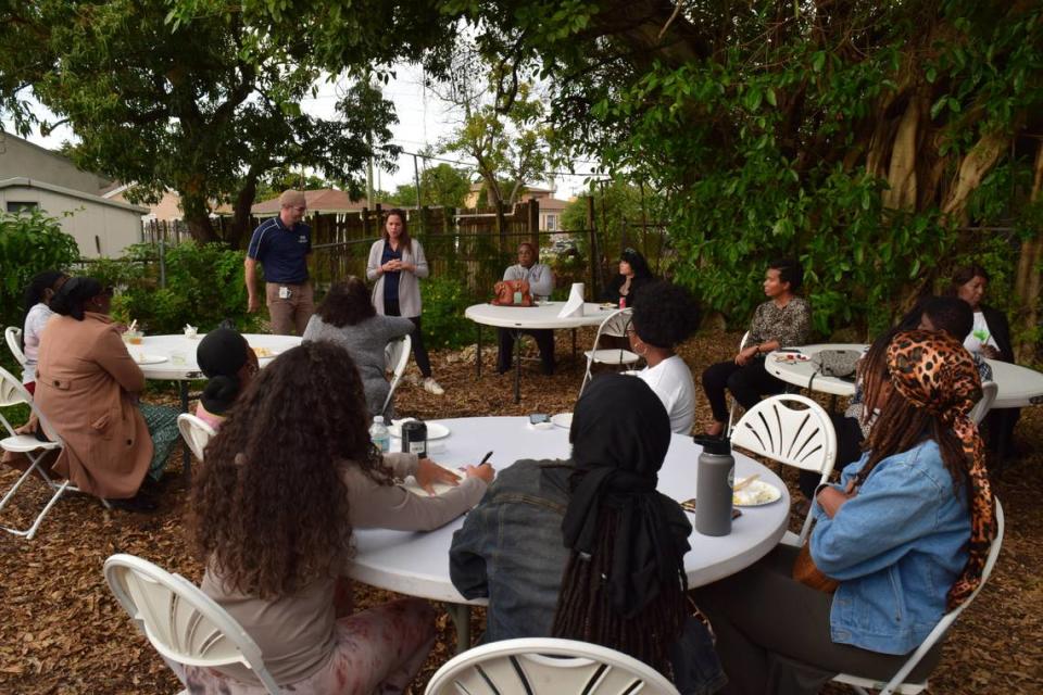 Empowering Resilient Women participants sit and listen to a presentation from FIU’s Neighborhood Health Education Learning Program.