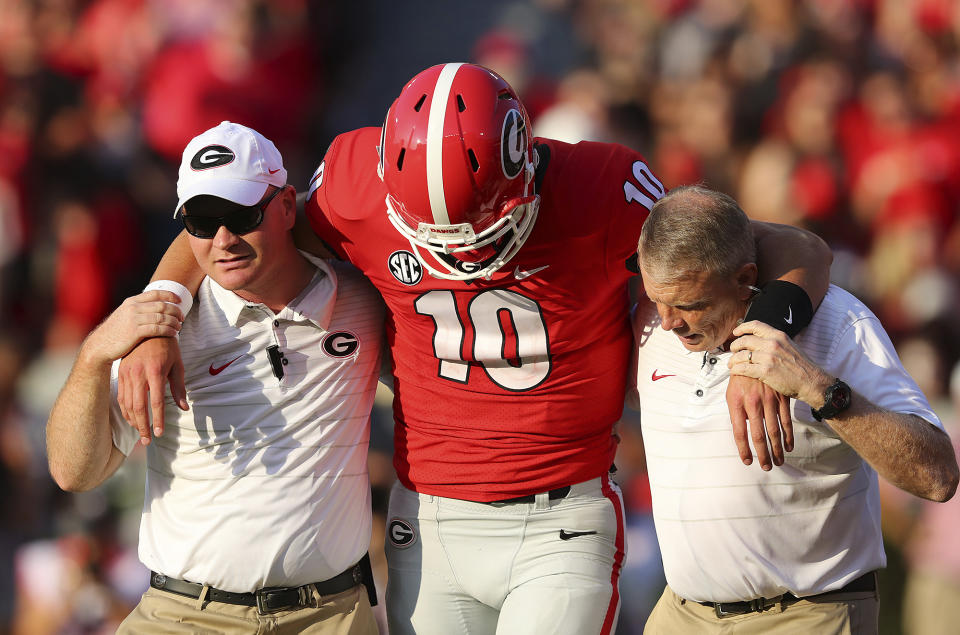 Georgia quarterback Jacob Eason leaves the NCAA college football game against Appalachian State with an injury during the first quarter Saturday, Sept. 2, 2017, in Athens, Ga. (Curtis Compton/Atlanta Journal-Constitution via AP)