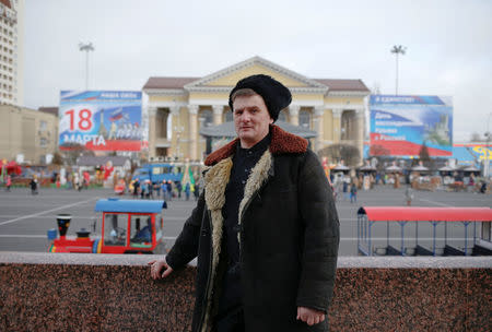 Alexander Reshetnyak, 42, Cossack ataman and supporter of presidential candidate Vladimir Putin, poses for a picture in Stavropol, Russia, February 16, 2018. "Of course, among the candidates right now, in my opinion no one can compete with our current president," said Reshetnyak. "There's no alternative. So yes, maybe these are elections without a genuine choice." REUTERS/Eduard Korniyenko