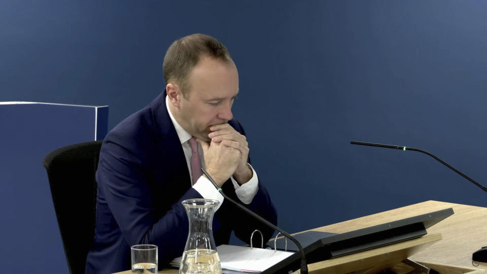 This grab taken from the UK COVID-19 Inquiry Live Stream shows former health secretary Matt Hancock giving evidence at Dorland House during its second investigation (Module 2) exploring core UK decision-making and political governance, in London, Thursday, Nov. 30, 2023. (UK Covid-19 Inquiry/PA via AP)