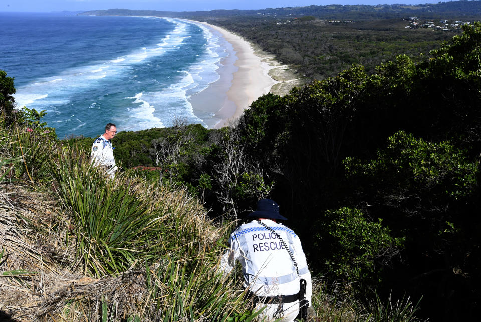 New South Wales police are seen in the Cape Byron State Conservation Area during the search for missing backpacker Theo Hayez in Byron Bay. 