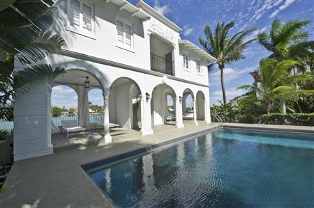 The pool house and pool of the waterfront mansion on Palm Island in Miami Beach, once owned by notorious gangster Al Capone, is shown in this handout photo provided by One Sotheby's International Realty February 8, 2014. REUTERS/One Sotheby's International Realty/Handout via Reuters