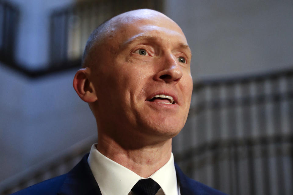 FILE - In this Nov. 2, 2017, photo, Carter Page, a foreign policy adviser to Donald Trump's 2016 presidential campaign, speaks with reporters following a day of questions from the House Intelligence Committee, on Capitol Hill in Washington. (AP Photo/J. Scott Applewhite)