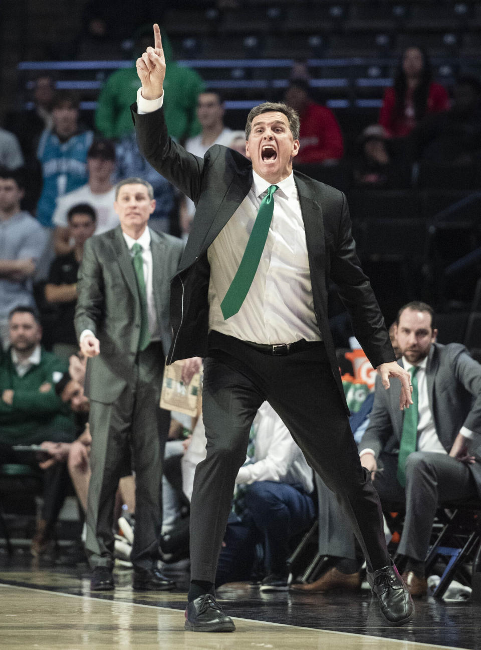 FILE - Utah Valley coach Mark Madsen directs his team during the second half of an NCAA college basketball game against Wake Forest on Tuesday, Nov. 15, 2022, in Winston-Salem, N.C. California is hiring a former Stanford star to revive its struggling basketball program. The Golden Bears have agreed to a contract with Mark Madsen to replace the fired Mark Fox following the worst season in school history. (Allison Lee Isley/The Winston-Salem Journal via AP, File)