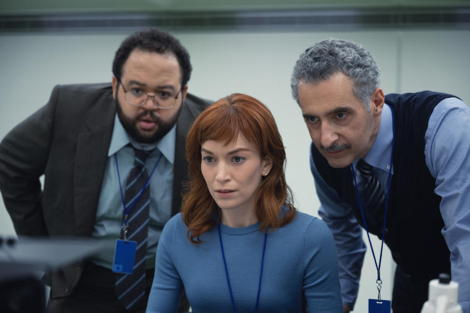 Zach Cherry, Britt Lower, and John Turturro in “Severance” - Credit: Wilson Webb / Apple TV+