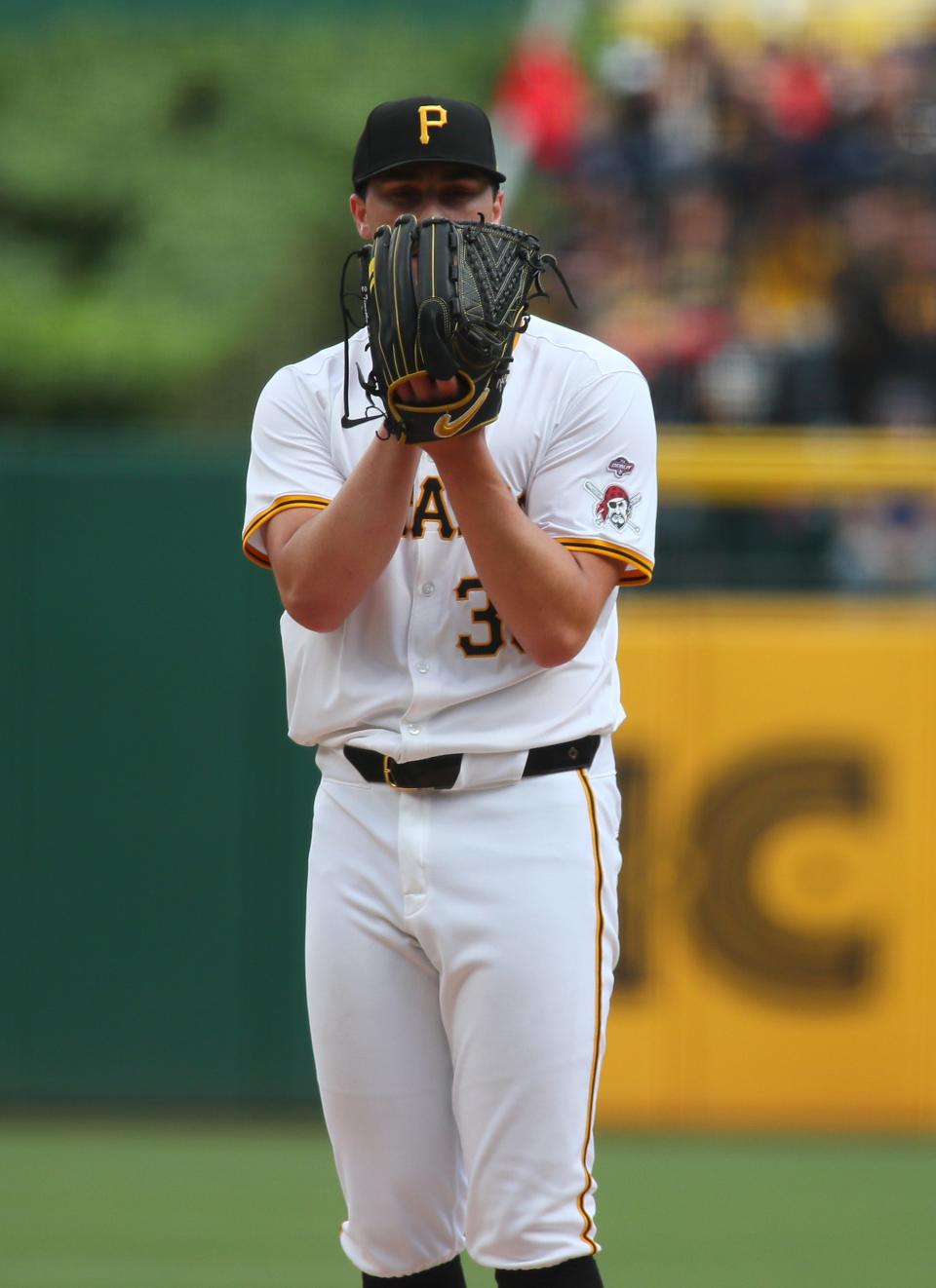 Pittsburgh Pirates starting pitcher Paul Skenes (30) eyes up the batter prior to delivering a pitch during the first inning of his MLB Debut against the Chicago Cubs the Saturday evening at PNC Park in Pittsburgh, PA.