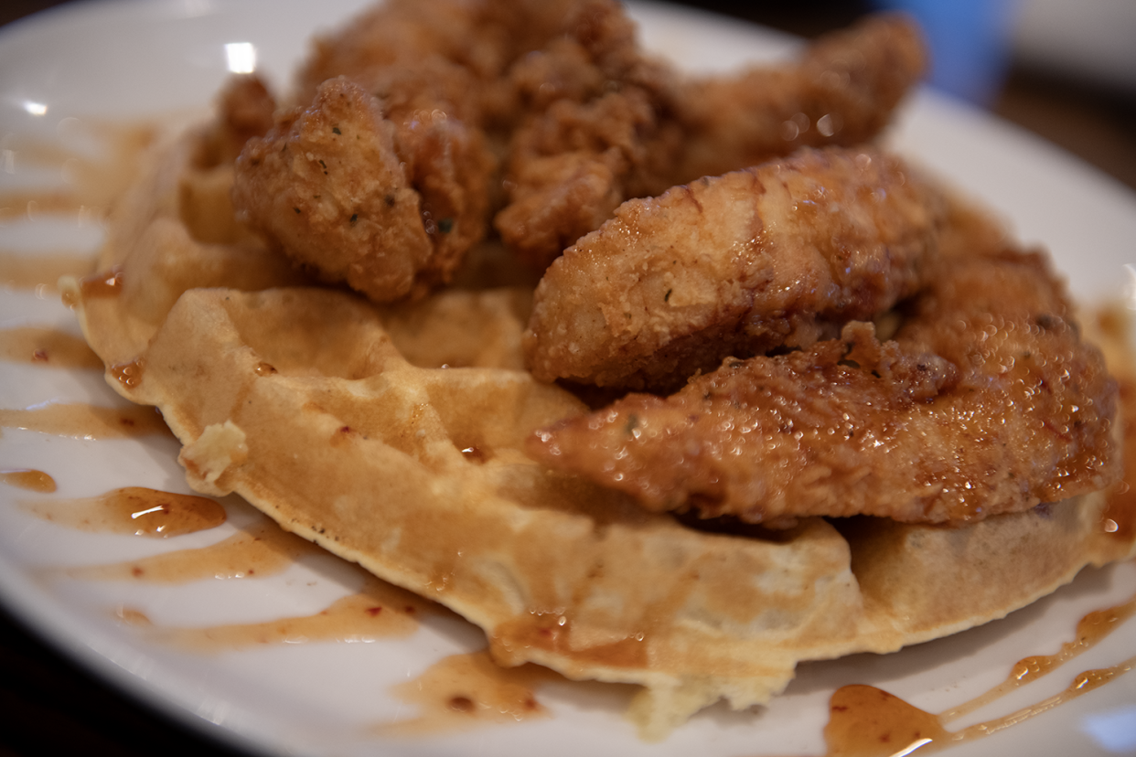 FILE - Chicken and waffles with housemade chipotle honey are among the savory favorites at Another Broken Egg Cafe. The franchise's Pooler location mad this year's list of top 100 brunch spots in the U.S. by Yelp.