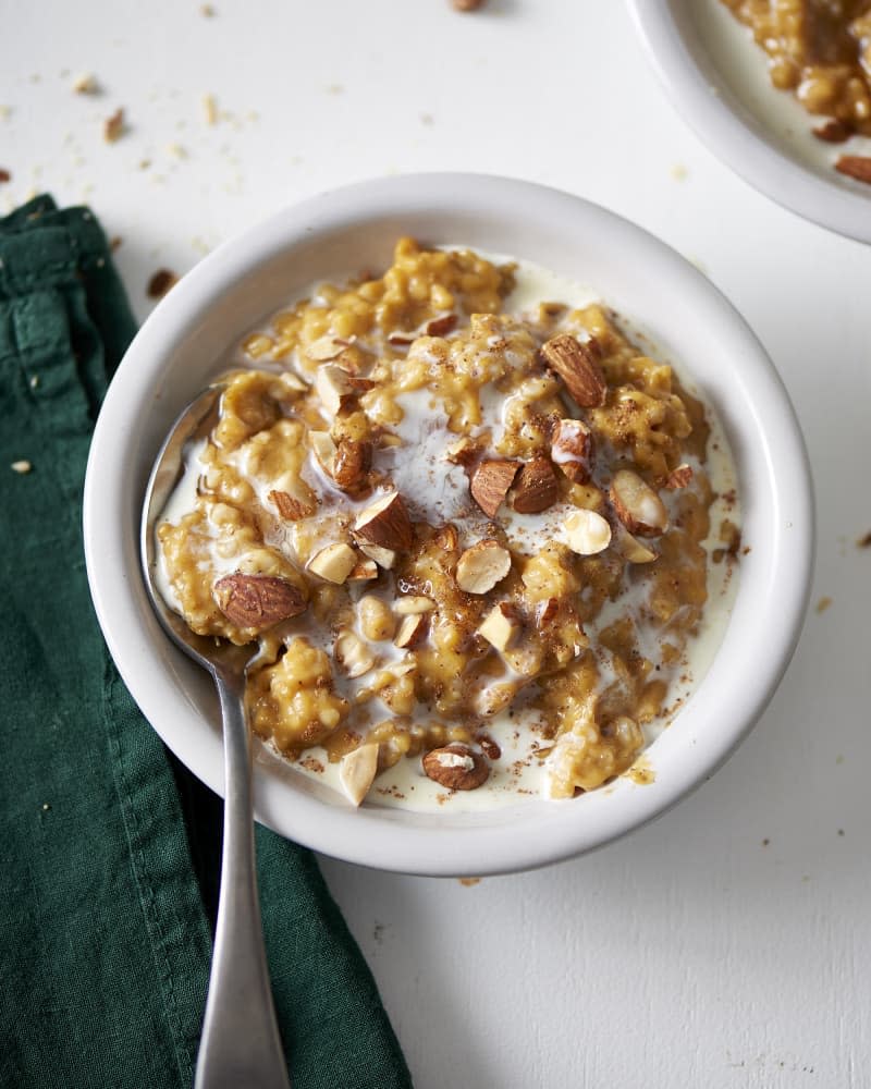 A bowl of pumpkin-spice oatmeal with chopped almonds